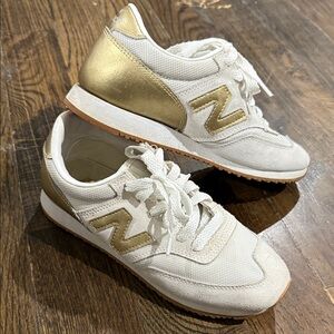 New Balance Women's Sneakers in Gold and White